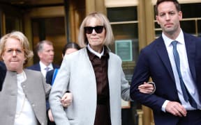 Writer E. Jean Carroll leaves as jury selection is set to begin in the defamation case against former US President Donald Trump brought by Carroll, who accused him of raping her in the 1990s, at the Manhattan Federal Court in New York on April 25, 2023. (Photo by Kena Betancur / AFP)