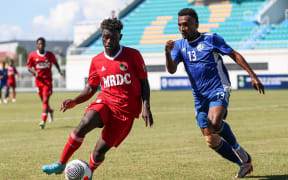 Hekari United FC's Nelson Karaun and Central Coast FC's Hudson Oreinima. OFC Men's Champions League 2025, Hekari United FC v Central Coast FC, National Stadium, Honiara, Monday 31 March 2025. Photo: Shane Wenzlick / www.phototek.nz