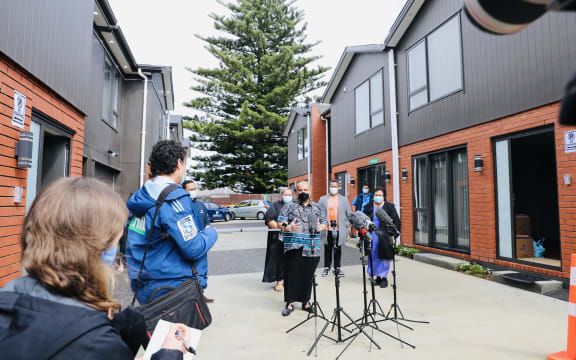 Pacific Peoples Minister Aupito William Sio speaks to media at homes for families coming out of quarantine.