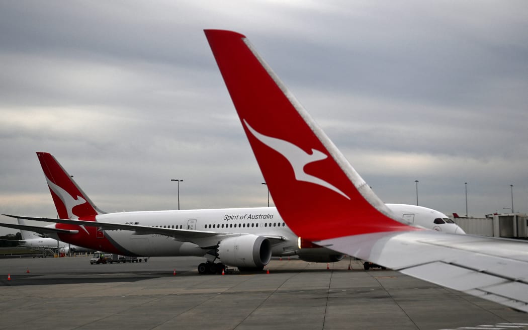 File photo. This picture taken on 29 June, 2025 shows Qantas planes on the tarmac at Perth International Airport.
