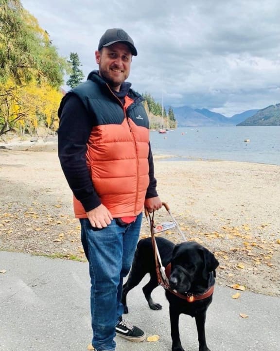 image of Dan Shepherd and his guide dog Ezra