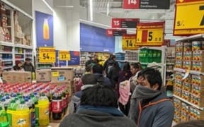 Supermarket queue in Puno in Peru where New Zealanders Holly Bates and her partner Karl Damon are stranded.