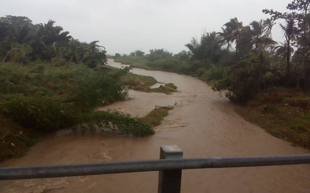 Mele river reportedly twice its usual height. Concerns raised about the bridge, which was damaged badly during cyclone Pam.