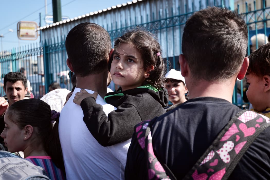 Syrian refugees in transit in Greece.