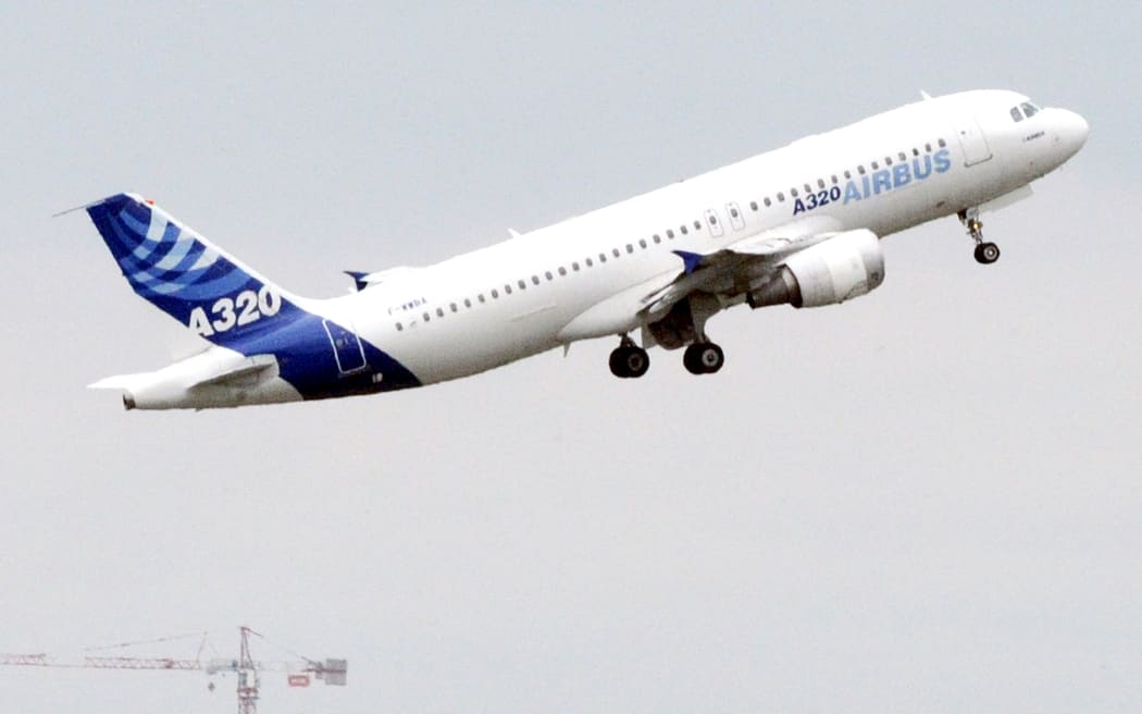 An Airbus A320 takes off from Toulouse, France.