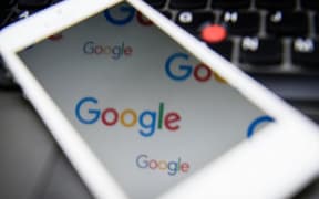 The logo for US technology company and search engine Google is displayed on screens in London on February 11, 2016.