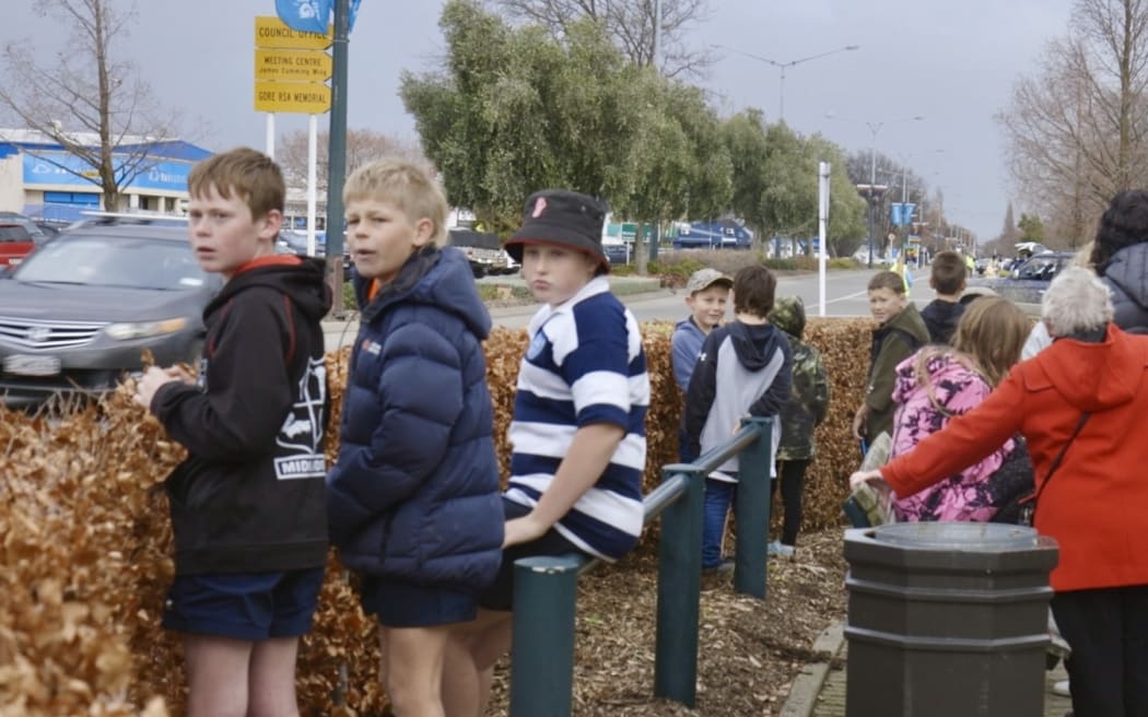Locals wait for the Gore Truck Show to begin.