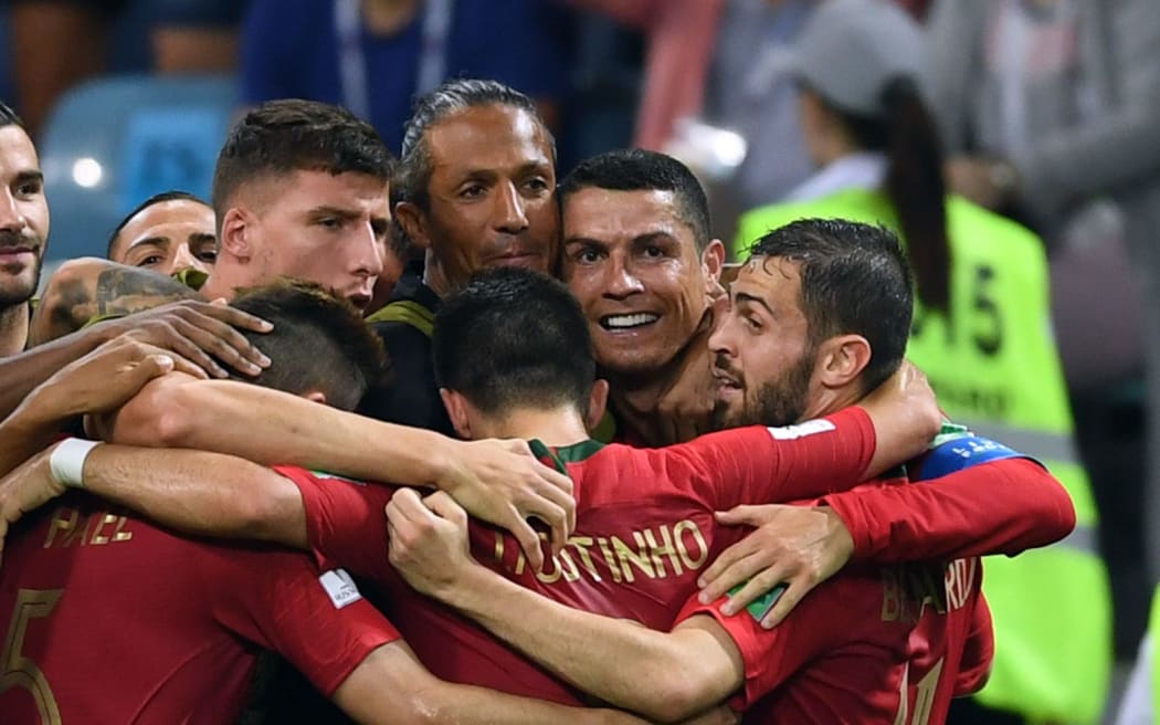 Cristiano Ronaldo celebrates with Portugal team mates.