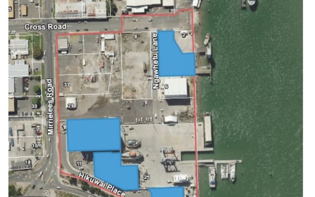 The precinct is outlined in red; the blue shaded areas were privately owned before the sale.