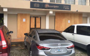 A boarded up business in Saipan.