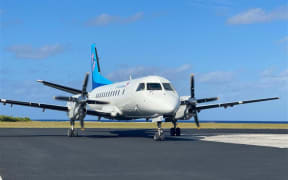 Air Rarotonga lands in Aitutaki.