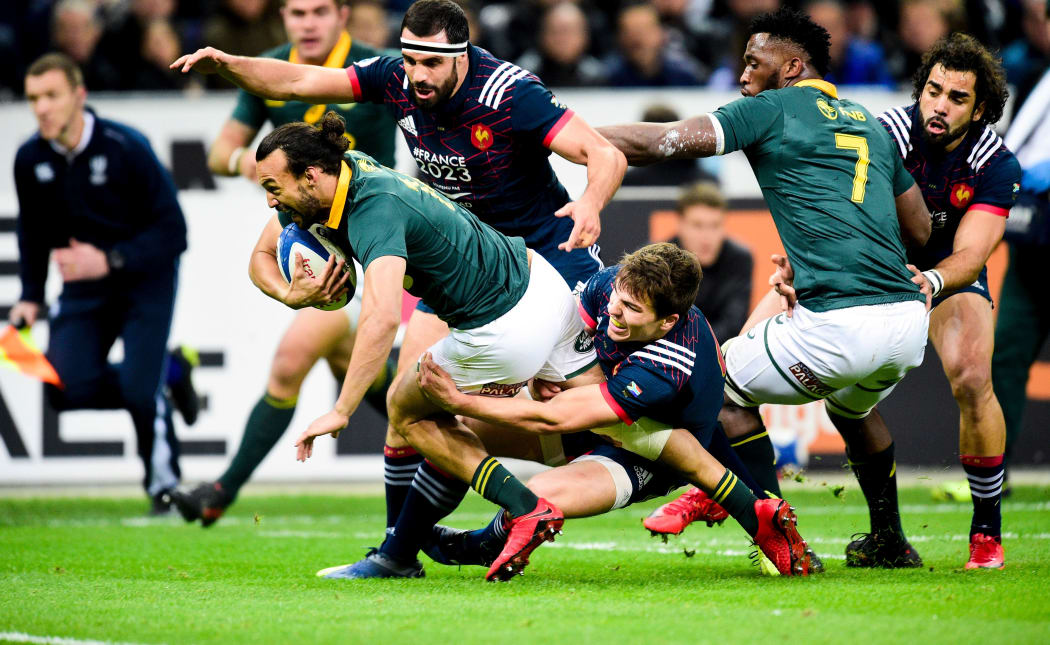 South Africa's Dillyn Leyds heads towards the try-line against France.