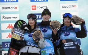 FIS Snowboard Women’s Big Air World Cup podium. Kokomo Murase (JPN) 2nd, Zoi Sadowski-Synnott (NZL) 1st, Momo Suzuki (JPN) 3rd.
