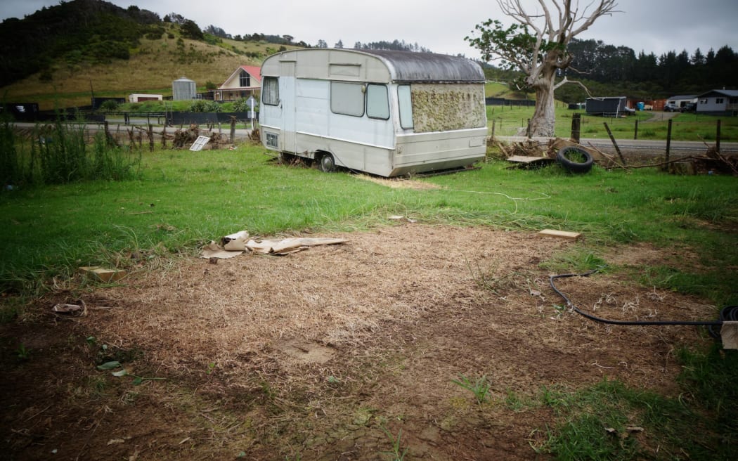 The caravan from the neighbours and the ground where a cabin used to be.