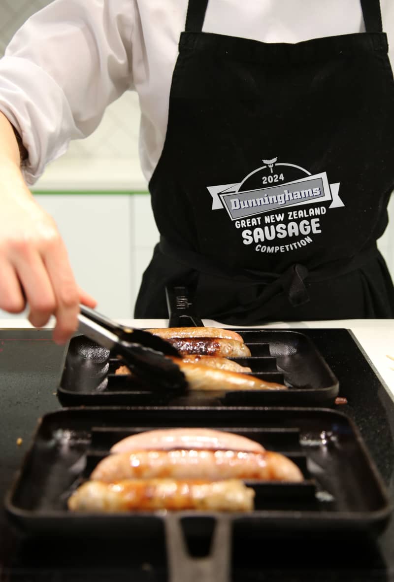 Sausages are cooked up for judges.