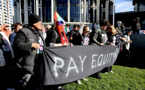 Budget Day 2025 - pay equity protestors voice their opinions outside Parliament