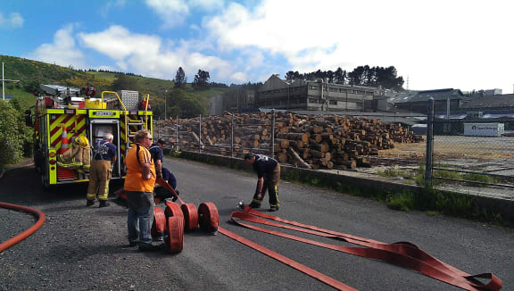 Fire crews pack up at the site.