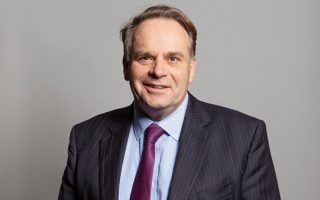 An undated handout photograph released by the UK Parliament shows Conservative MP for Tiverton and Honiton, Neil Parish, posing for an official portrait photograph at the Houses of Parliament in London. - Britain's ruling Conservative party on Friday suspended one of its MPs pending an investigation into claims he watched pornography on his mobile phone in the House of Commons chamber. The identification of MP Neil Parish, 65, ends days of speculation since the allegation emerged on Tuesday, amid accusations of a misogynistic environment in parliament. (Photo by Richard Townshend / UK PARLIAMENT / AFP) / RESTRICTED TO EDITORIAL USE - NO USE FOR ENTERTAINMENT, SATIRICAL, ADVERTISING PURPOSES - MANDATORY CREDIT " AFP PHOTO / RICHARD TOWNSHEND /UK Parliament"