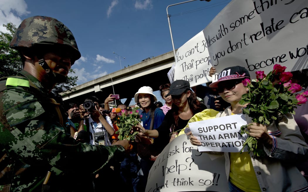 Bangkok citizens showing support for the military.