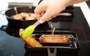 Sausages being cooked in the 2022 Great New Zealand Sausage Competition.
