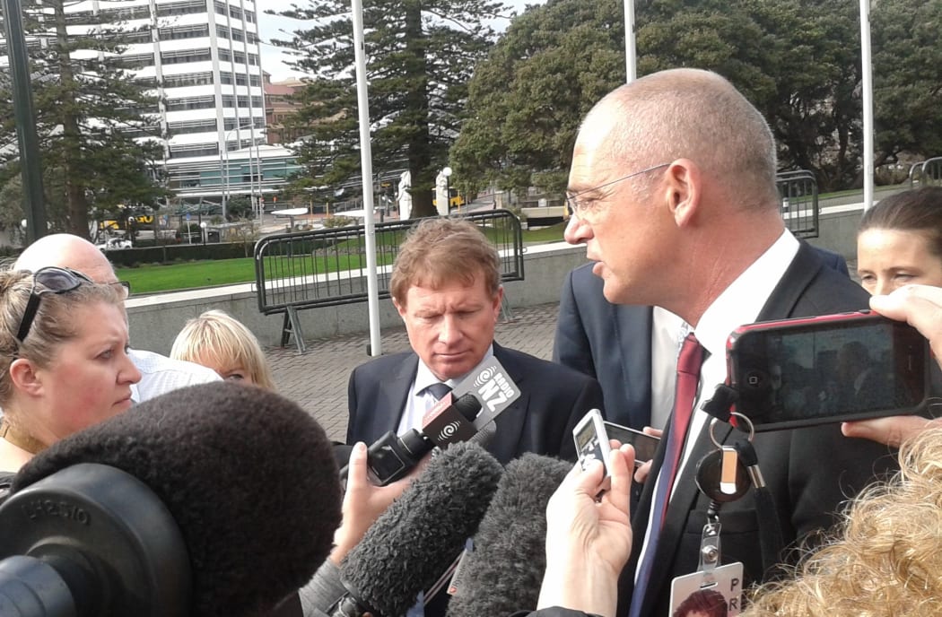 John Wilson, centre, and Theo Spierings, right, arrive at Parliament.