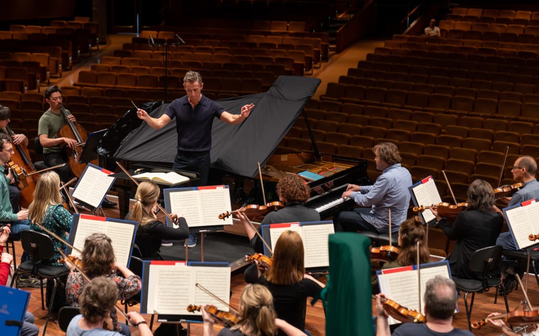 The NZSO with pianist Stephen De Pledge and guest conductor Alexander Shelley rehearsing Mozart's Piano Concerto No 20 ahead of their 2022 Legacy concert.