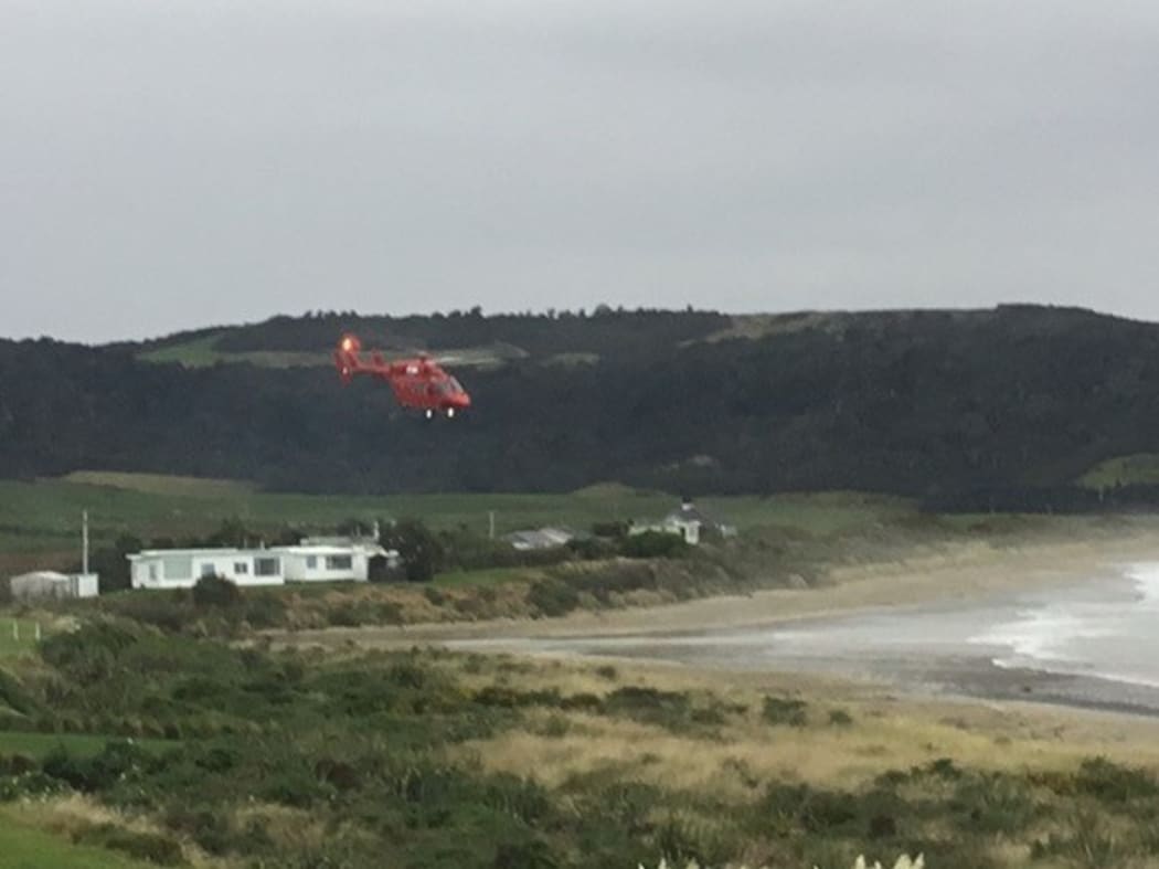 A Westpac rescue helicopter comes in to land at Curio Bay