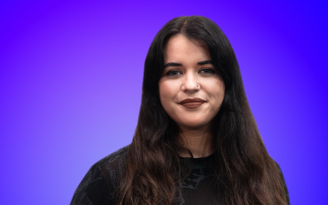 Host Maggie Tweedie in front of a bright blue and purple gradient background