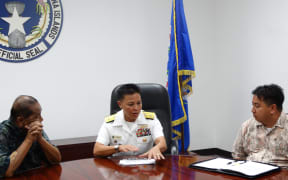 Joint Region Marianas commander Rear Adm. Bette Bolivar with Governor Iloy Enos and deputy Ralph Torres