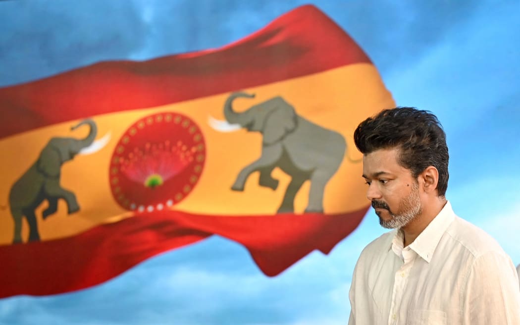 Actor-turned-politician Vijay unveils Tamizhaga Vetri Kazhagam flag and symbol : Actor-turned-politician Vijay after unveiling the flag and symbol of his party Tamizhaga Vetri Kazhagam, at Party office in Chennai on August 22, 2024. The Times of India/Ramesh Shankar R. (Photo by Ramesh Shankar R / The Times of India via AFP)