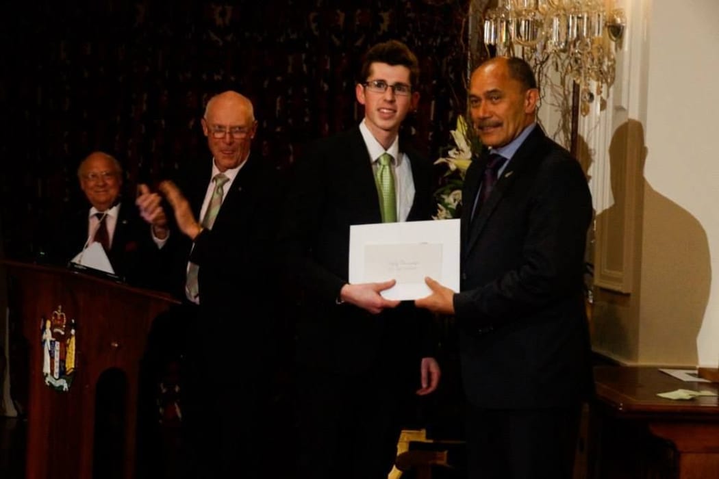 Sam Hall-McMaster being presented with the Sir Paul Callaghan Award for Young Science Orators 2014 by the Governor-General, Lt Gen The Rt Hon Sir Jerry Mateparae