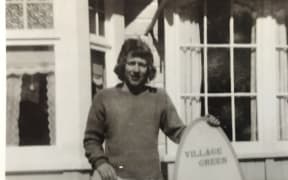 Barry Watkins pictured with his broken surfboard after the shark attack