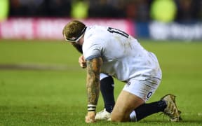 England's Joe Marler reacts on the final whistle in the Six Nations international rugby union match between Scotland and England at Murrayfield Stadium.