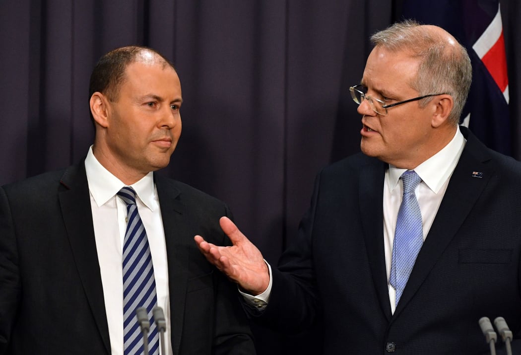 Australia's incoming Prime Minister Scott Morrison (R) and deputy Liberal leader Josh Frydenberg