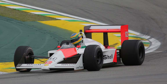 Bruno Senna behind the wheel of the 1988 McLaren MP4/4 raced by his late uncle, three time world champion, Ayrton Senna.