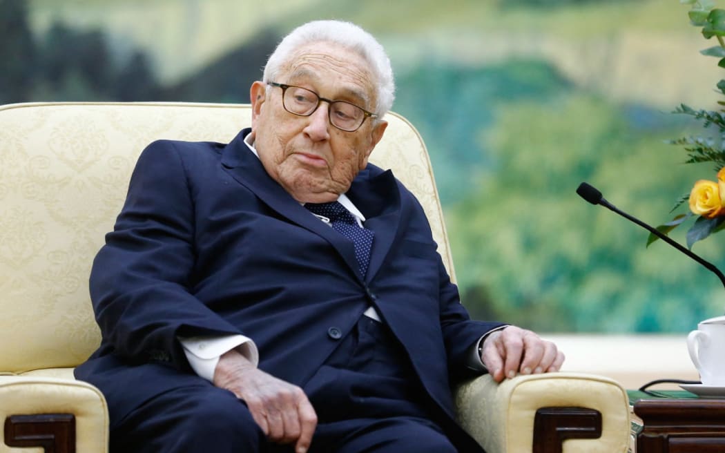 Former US secretary of state Henry Kissinger meets China's President Xi Jinping (not pictured) at the Great Hall of the People in Beijing on November 8, 2018. (Photo by THOMAS PETER / POOL / AFP)