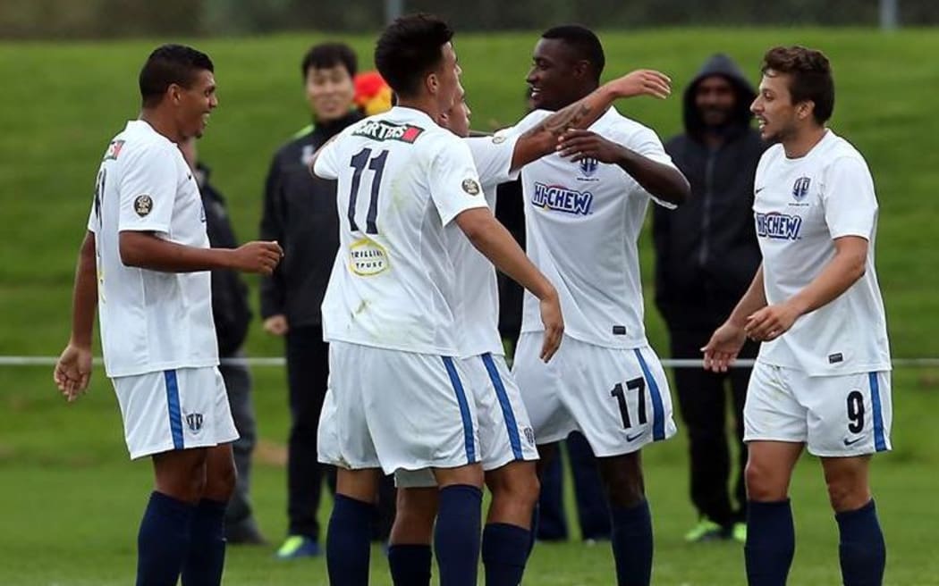 Joao Moreira (17) is congratulated after scoring a late winner for Auckland City against Lae City Dwellers.