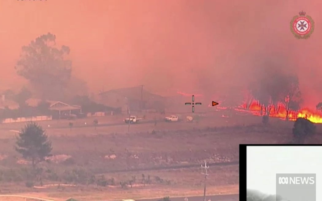 Bushfires rapidly approach Wallangarra homes.