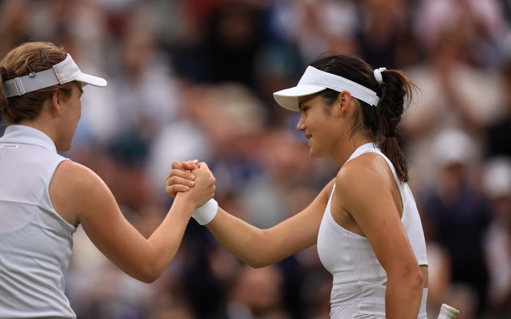 Emma Raducanu of United Kingdom shakes hands with Lulu Sun of New Zealand after losing the ladies’ singles 4th round match on the day 7 of the Wimbledon tennis championships at All England Lawn Tennis and Croquet Club in London, United Kingdom on July 7, 2024. Lulu Sun won the match to advance to quarterfinals.( The Yomiuri Shimbun ) (Photo by Takuya Matsumoto / Yomiuri / The Yomiuri Shimbun via AFP)
