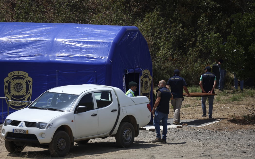 Portuguese Judicial Police (PJ) criminal investigation unit members remove equipment set near the Arade dam in Silves on May 25, 2023, after the completion of the search operation in the investigation into the disappearance of Madeleine McCann.