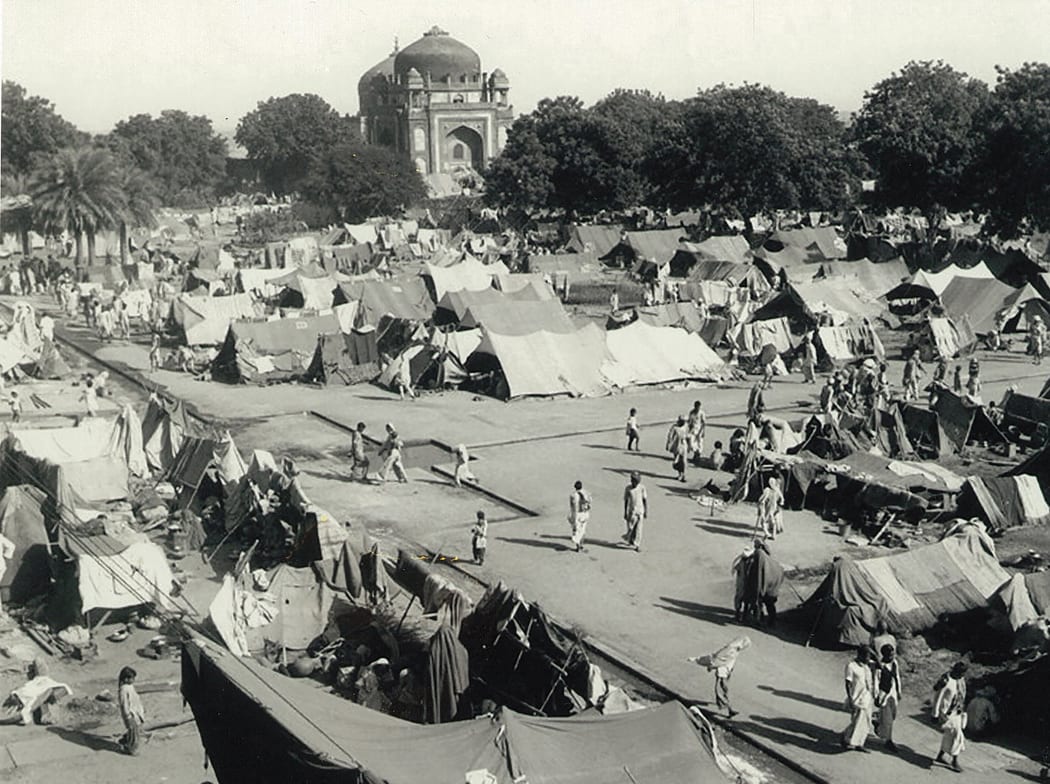 A camp for displaced Indian Muslims next to Humayun's Tomb in New Delhi, 1947, during the period of unrest following the Partition of India and Pakistan.