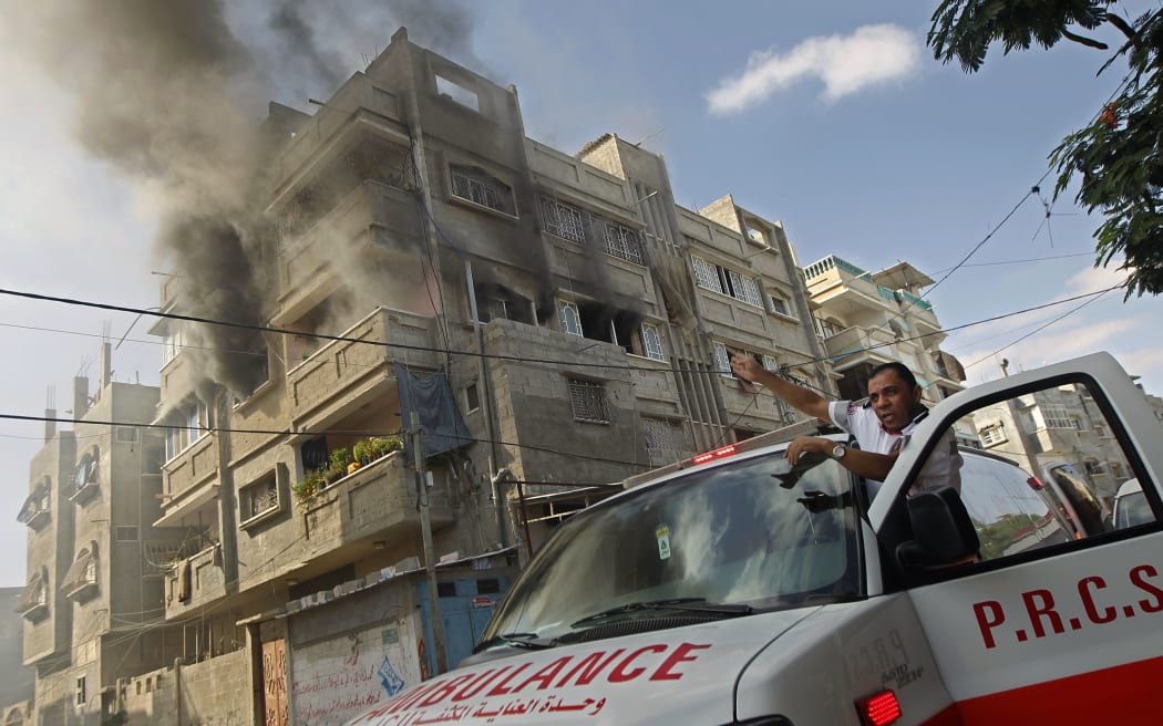 Smoke rises from a building after an Israeli strike on Rafah in the southern Gaza Strip on Thursday.