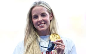 British gold medallist Keely Hodgkinson celebrates on the podium after winning the women's 800m during the Paris 2024 Olympic Games, on 6 August, 2024.