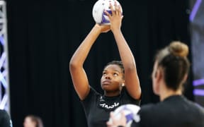 Maia Wilson looks on as Grace Nweke warms up before the Cadbury Netball Series in Palmerston North, October 2020.