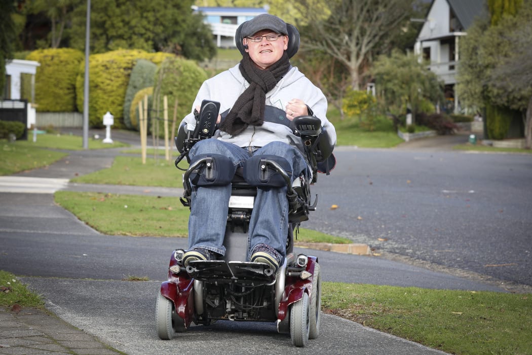 Tim Lee is a wheelchair user and says e-scooters across footpaths could be another obstacle for wheelchair users, but is open-minded to the trial if it's monitored and evaluated well.