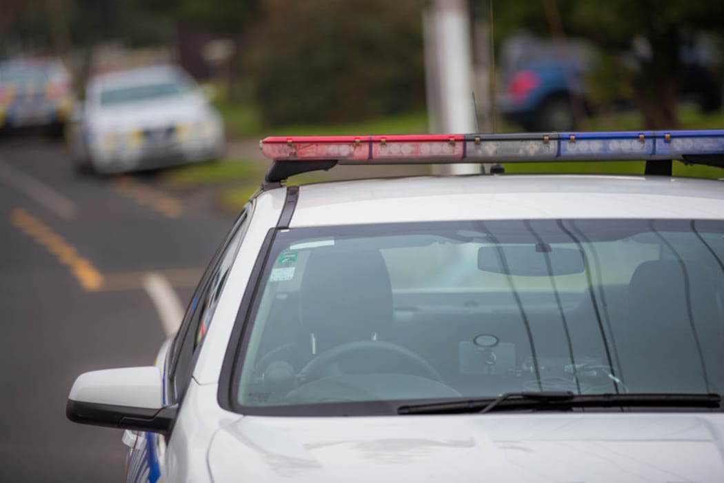 A police car out in the community. 6 July 2016.