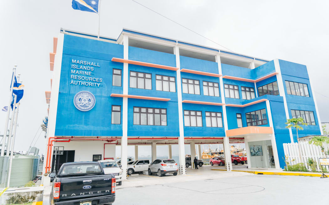 The Marshall Islands Marine Resources Authority headquarters in Majuro opened in 2019 and includes sophisticated monitoring, control and surveillance facilities. Photo: Chewy Lin.

2. MIMRA Nautilus:
Marshall Islands Marine Resources Authority Director Glen Joseph, left, and Minister of Natural Resources and Commerce Tony Muller head the fisheries sector in the Marshall Islands. Photo: Giff Johnson.

3. MIMRA tuna
The Marshall Islands Marine Resources Authority operates 100 percent coverage of tuna transshipment operations in Majuro lagoon with its Fisheries Enforcement staff making dozens of visits to vessels each month to monitor their operations. Photo: Francisco Blaha.