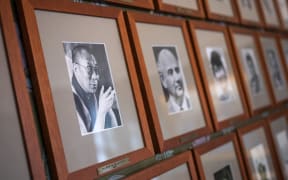This photo taken on September 25, 2024 shows a portrait of the Dalai Lama, Nobel Peace Prize laureate of 1989, next to other photographs of laureates on a wall of the committee meeting room at the Norwegian Nobel Institute in Oslo, Norway. The 2024 Nobel Prize announcements will take place from October 7-14. The winner of the Nobel Peace Prize will be announced in Oslo on October 11. (Photo by Jonathan NACKSTRAND / AFP)