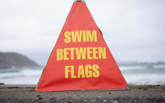 Swim between the flags