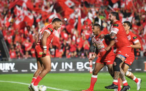 Tevita Pangai Junior celebrates after scoring for Tonga against Australia in October.